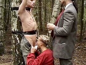 Businessman Is Humiliating His Tied Mate In The Forest