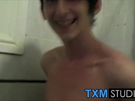 An uncut twink Max Brown takes a shower and starts wanking